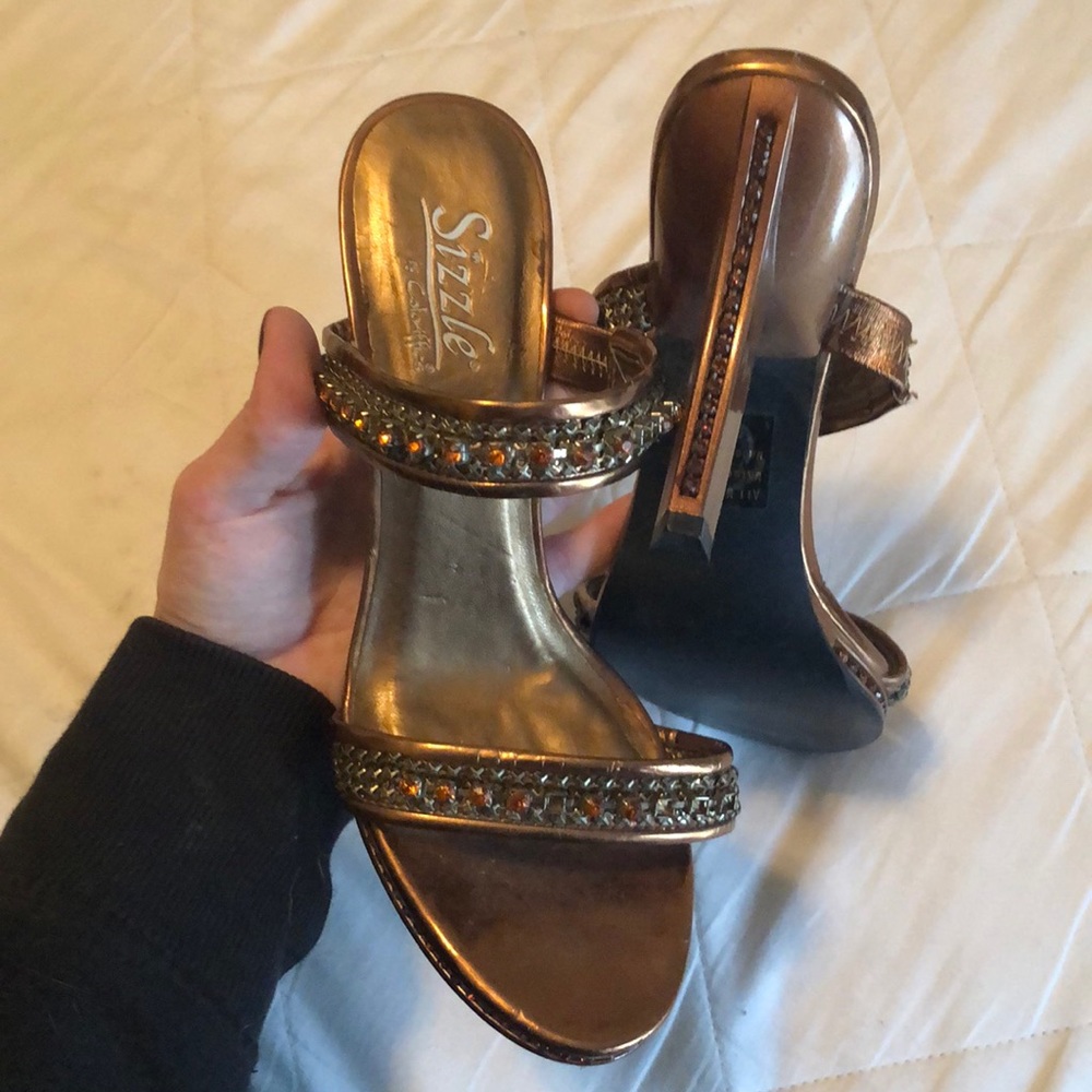 Bronze gold And amber colored shoes